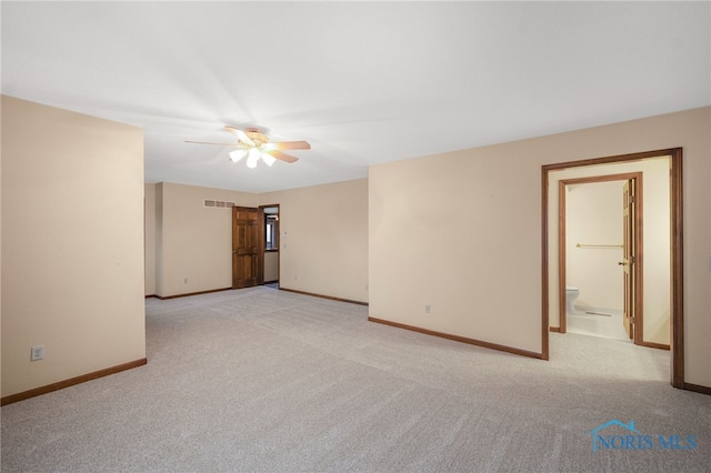 carpeted empty room with ceiling fan