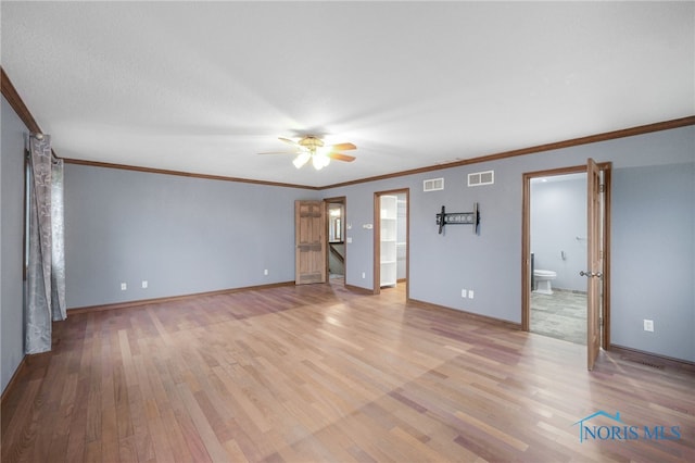 interior space featuring ceiling fan, crown molding, and light hardwood / wood-style flooring