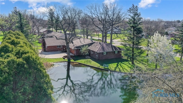 drone / aerial view with a water view