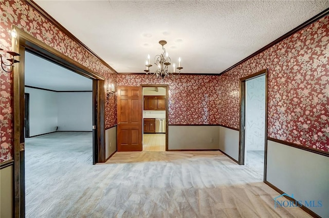 1362 Conneaut Ave, Bowling Green, OH 43402 - unfurnished dining area with wallpapered walls, ornamental molding, light colored carpet, a chandelier, and wainscoting