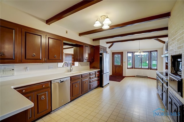 kitchen featuring sink, stainless steel appliances, an inviting chandelier, vaulted ceiling with beams, and pendant lighting