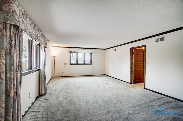 1362 Conneaut Ave, Bowling Green, OH 43402 - carpeted empty room featuring ornamental molding and baseboards