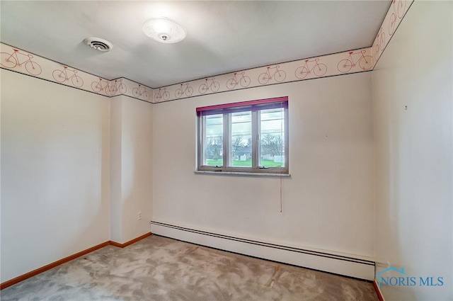 1362 Conneaut Ave, Bowling Green, OH 43402 - empty room with a baseboard radiator, carpet flooring, and baseboards