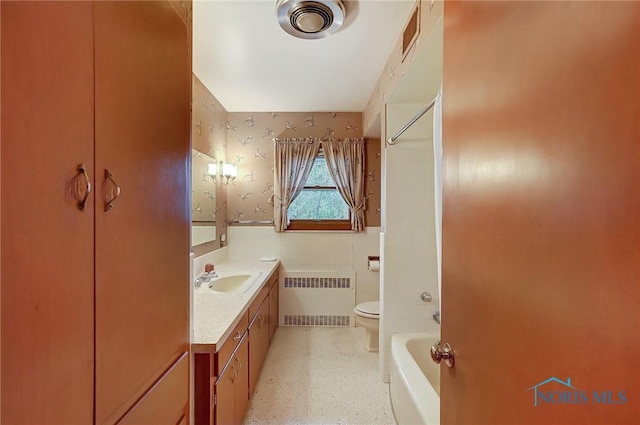 1362 Conneaut Ave, Bowling Green, OH 43402 - full bath featuring radiator heating unit, toilet, vanity, shower / bath combination, and wainscoting