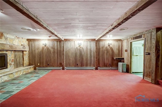 1362 Conneaut Ave, Bowling Green, OH 43402 - finished below grade area featuring freestanding refrigerator, a fireplace, wood walls, and carpet flooring