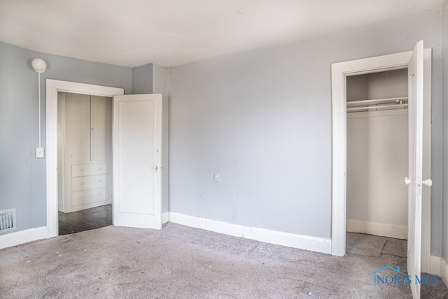 unfurnished bedroom with a closet