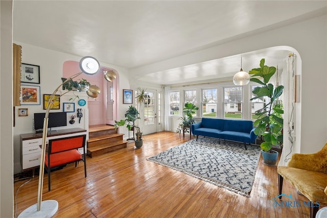 living area with hardwood / wood-style floors