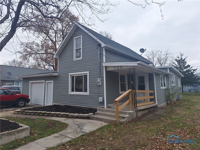 view of front of property with a garage