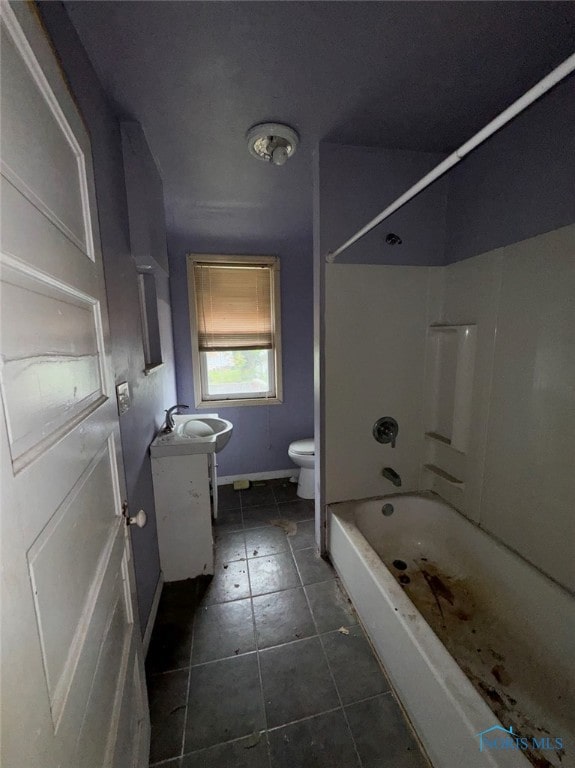 full bathroom featuring tile patterned floors, vanity, toilet, and tub / shower combination