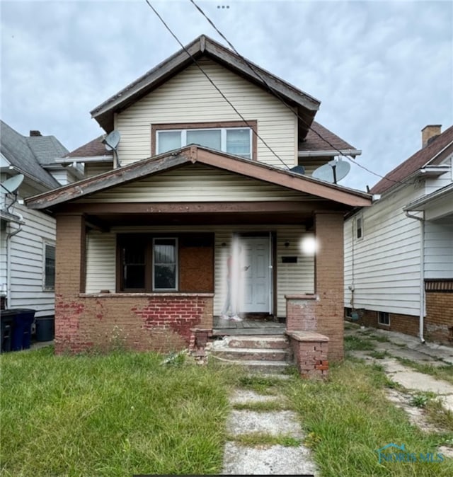 bungalow featuring covered porch