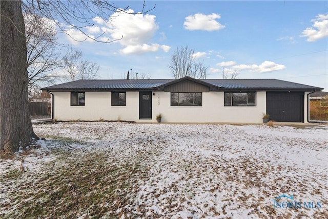 single story home with a garage