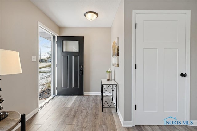 foyer with light wood-type flooring