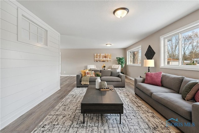 living room with dark wood-type flooring