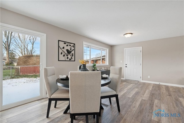 dining space featuring light hardwood / wood-style flooring