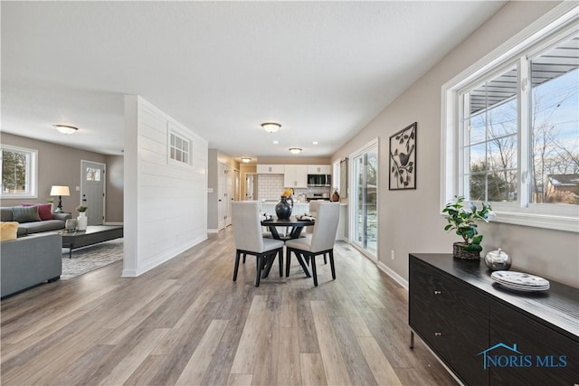 dining room featuring light hardwood / wood-style floors