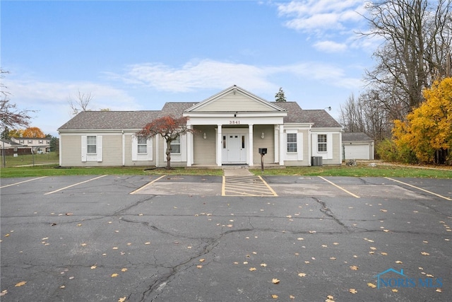 view of front of house featuring central AC