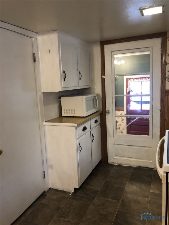 kitchen with white cabinets