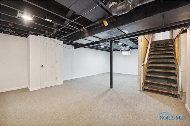 basement featuring carpet flooring