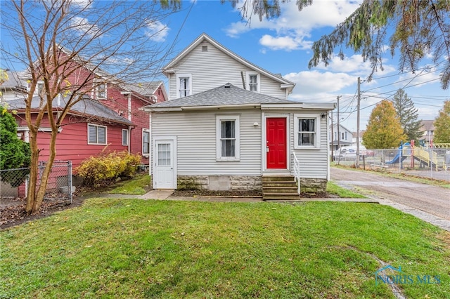 view of front of home with a front yard