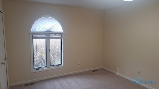 view of carpeted spare room