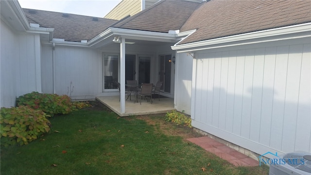 exterior space with a lawn and a patio area