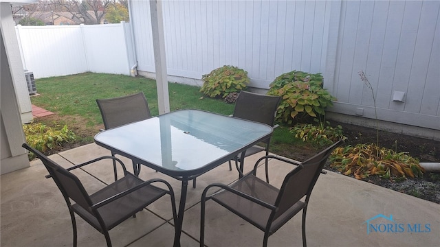 view of patio with central AC unit