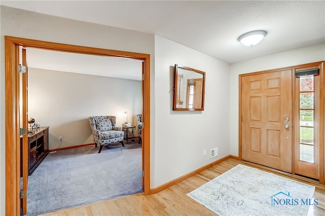 entryway featuring wood-type flooring