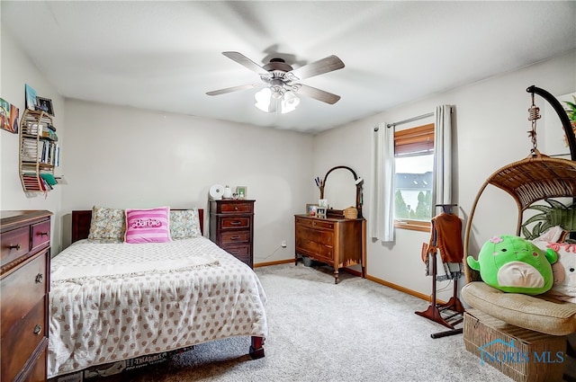 bedroom with light colored carpet and ceiling fan