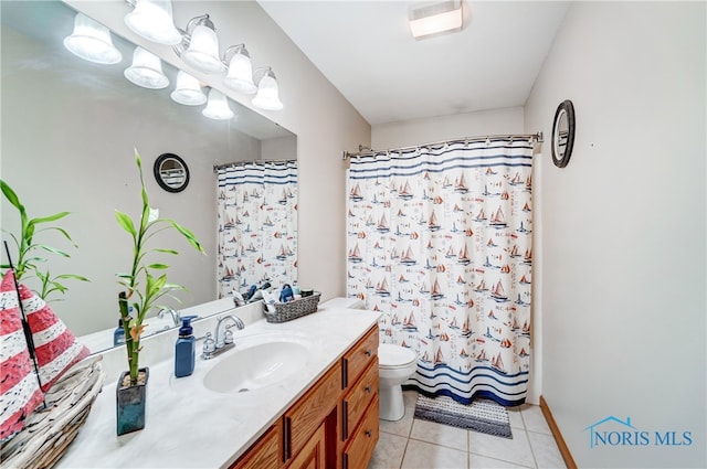 bathroom with tile patterned flooring, vanity, curtained shower, and toilet