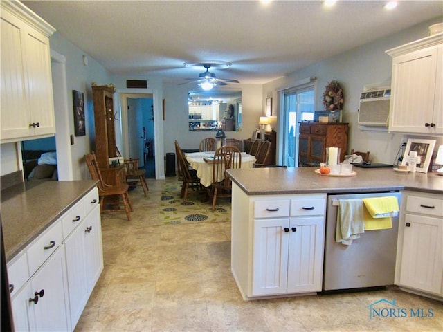 kitchen featuring white cabinetry, ceiling fan, and stainless steel dishwasher