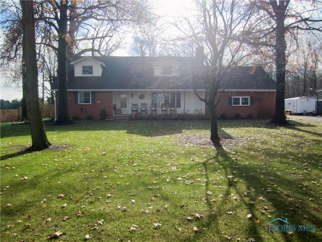 view of front facade with a front lawn