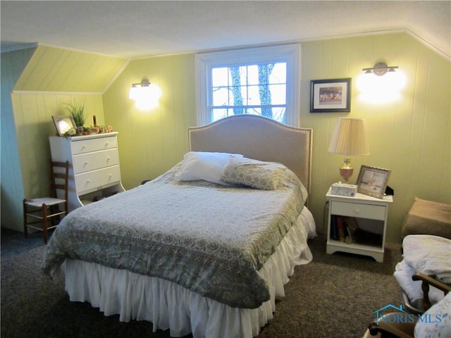 carpeted bedroom featuring vaulted ceiling