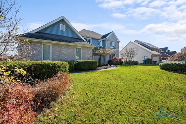 view of front property with a front yard