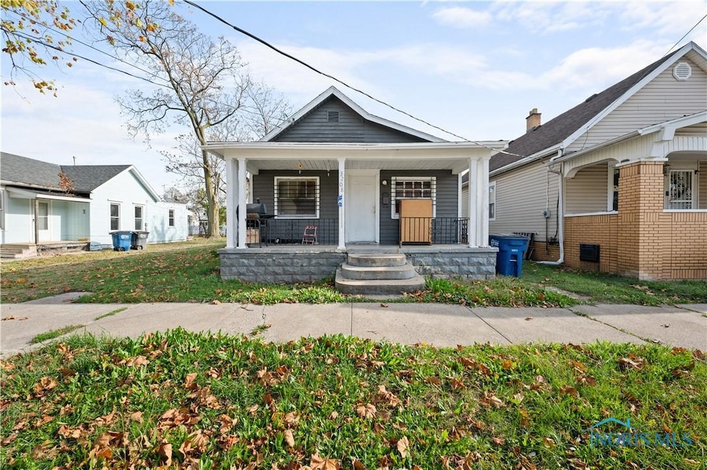 bungalow-style home featuring a porch