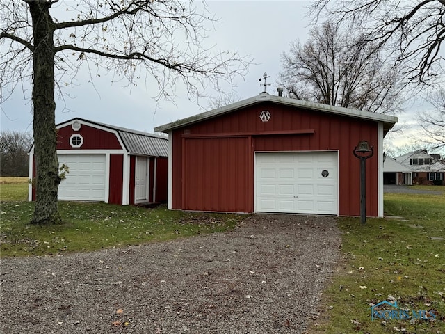 garage featuring a yard