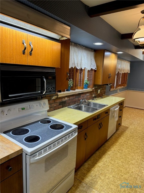 kitchen with decorative backsplash, sink, beam ceiling, white electric stove, and dishwasher