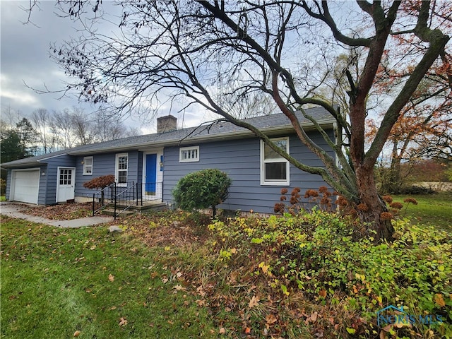 ranch-style home with a garage