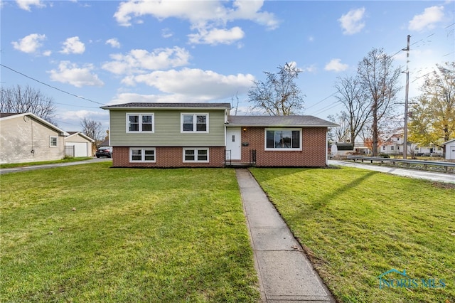 tri-level home featuring a front yard