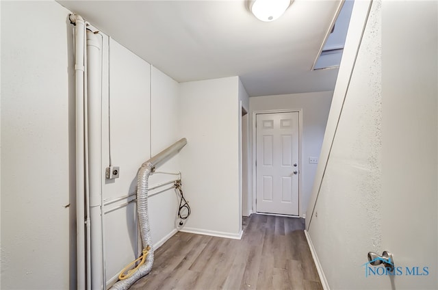 hallway featuring light hardwood / wood-style floors