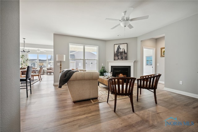3343 Moonlit Pass, Monclova, OH 43542 - living room featuring ceiling fan and hardwood / wood-style floors
