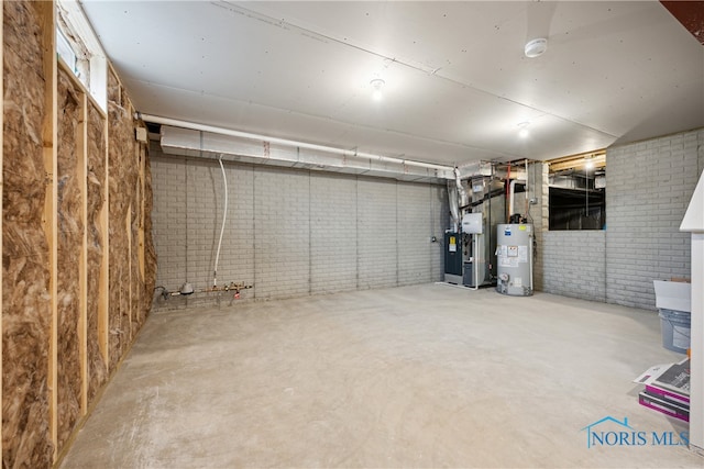 3343 Moonlit Pass, Monclova, OH 43542 - basement with brick wall and gas water heater