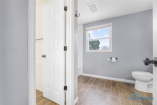 bathroom featuring toilet