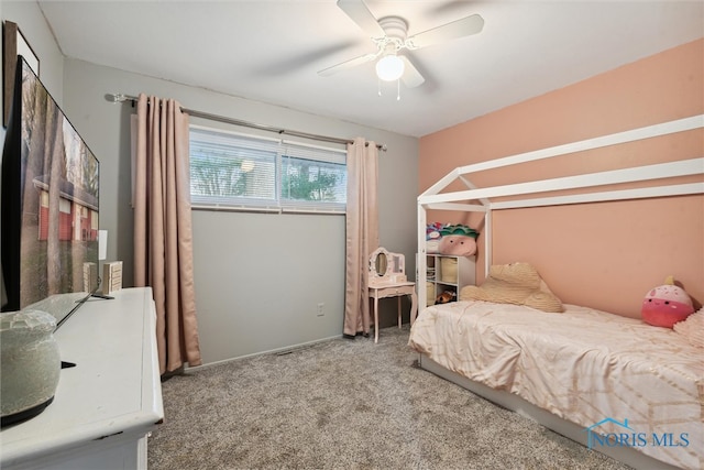 bedroom with ceiling fan and carpet floors