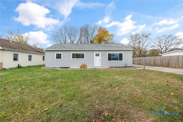 view of front of property with a front lawn