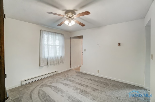 spare room with ceiling fan, light colored carpet, and a baseboard radiator