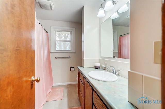 bathroom featuring vanity