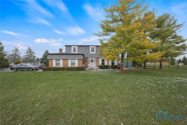 view of front of house with a front yard