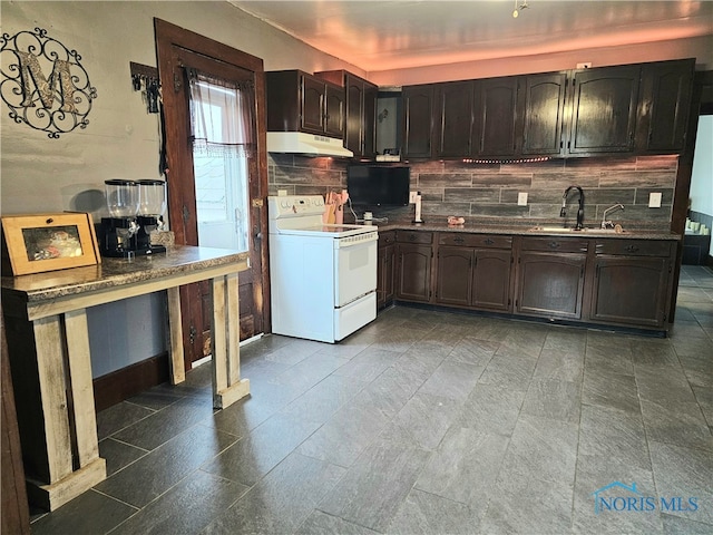 kitchen with white range with electric stovetop, dark brown cabinetry, decorative backsplash, and sink