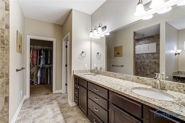 bathroom featuring tile patterned floors and vanity