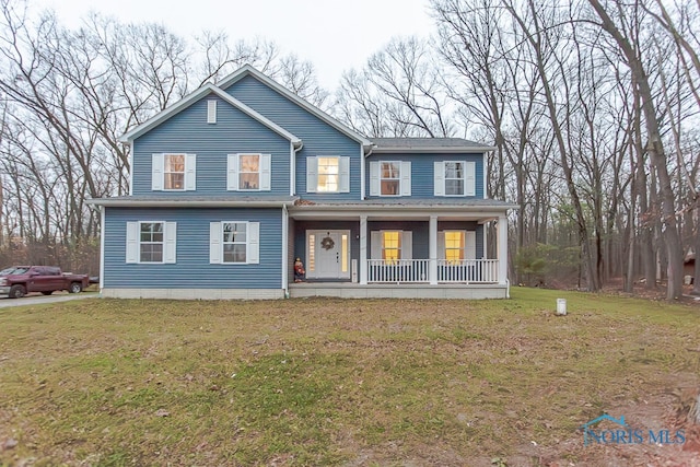 6336 S Berkey Southern Rd, Whitehouse, OH 43571 - view of front of property with covered porch and a front lawn